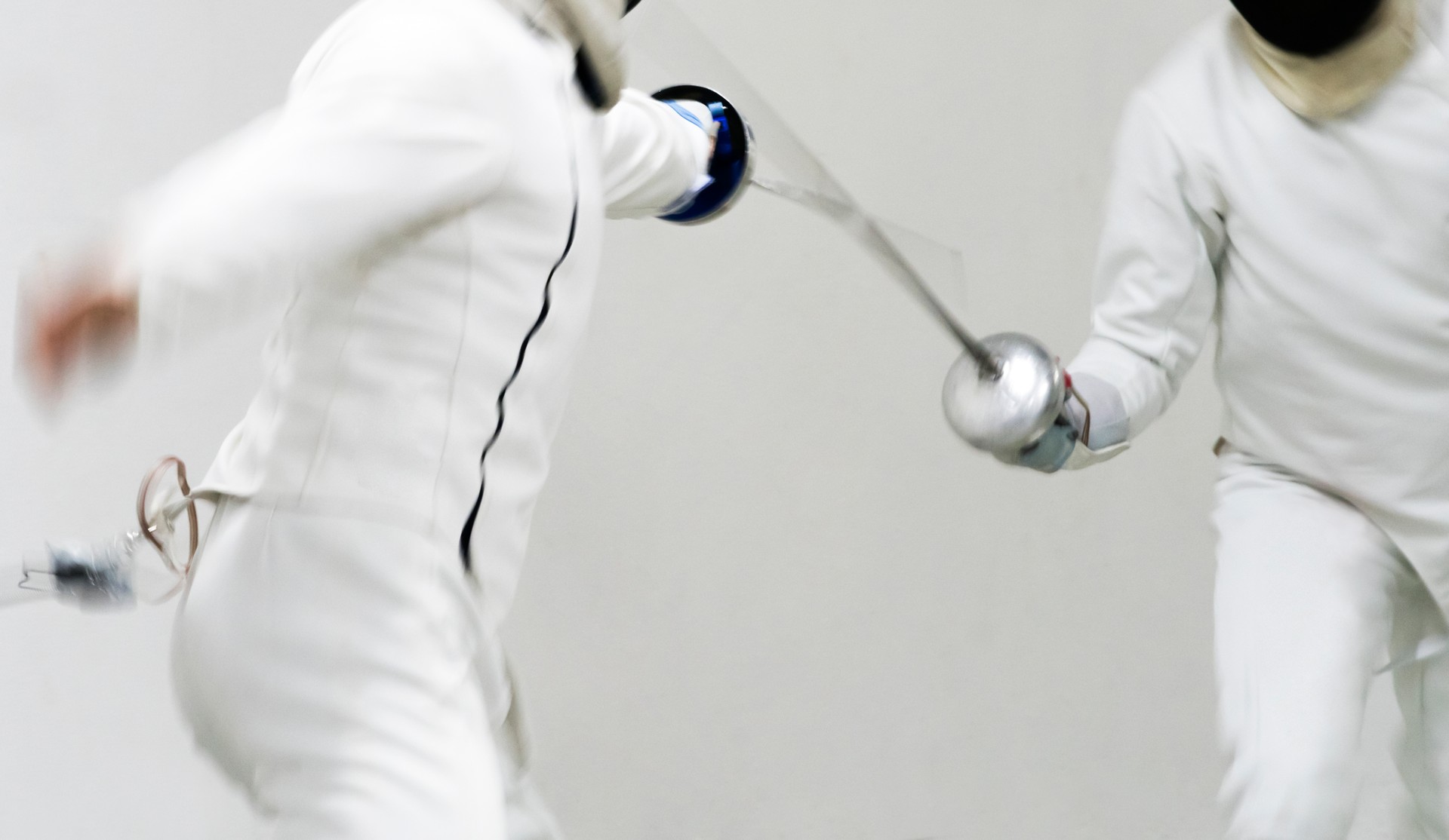 Two Professional Fencers Show Masterful Swordsmanship in their Foil Fight.